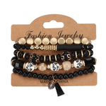 8940NINEXIS - CWAJE05695_BOHO CRYSTAL PENDANT MULTI LAYER ELASTIC BRACELET: Black / (OS) 1